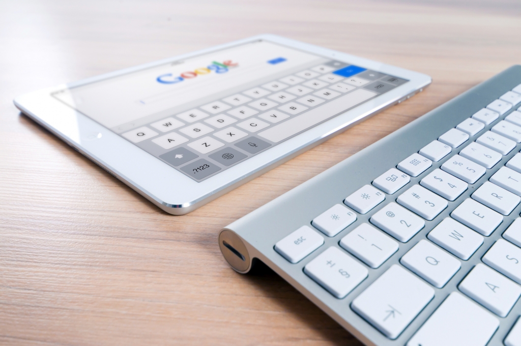 tablet with keyboard open on Google search page